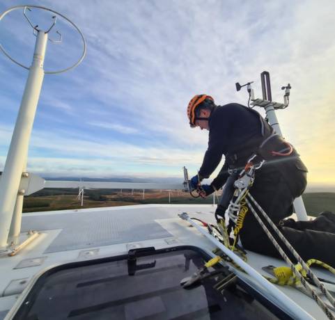 Scottish Power technician on a wind turbine